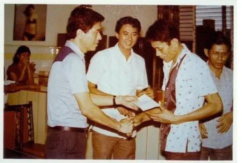 An archive photograph from IPI’s early decades, showing staff at the company’s Cebu premises and at company gatherings