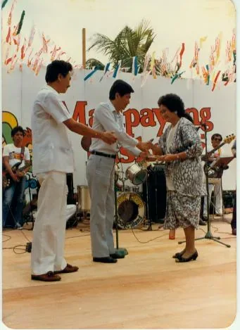An archive photograph from IPI’s early decades, showing staff at the company’s Cebu premises and at company gatherings